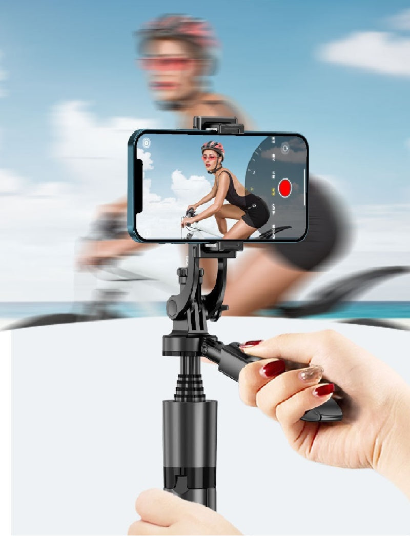 Adjustable phone tripod mount recording a female cyclist outdoors